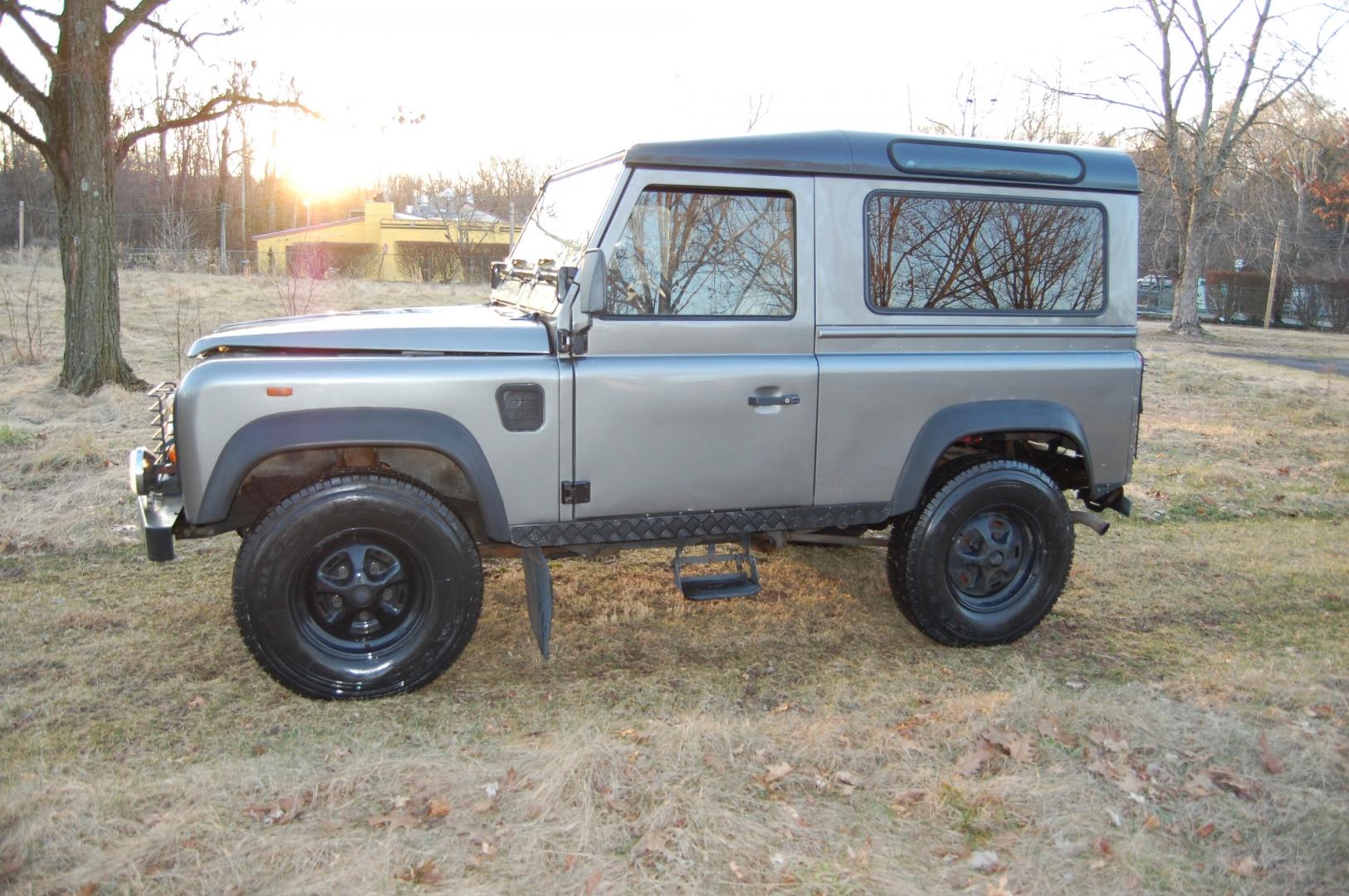 1990 Gray /Black Land Rover Defender (SALLDVAB8FA) with an Diesel engine, 5 speed manual transmission, located at 6528 Lower York Road, New Hope, PA, 18938, (215) 862-9555, 40.358707, -74.977882 - Here is a great running, great looking turn key 1990 Land Rover Defender.....Diesel engine, 5 speed manual transmission, roll up windows, black leather seats, steel wheels, 7.50R60 Silca Come 4x4 tires, fog lights, trailer hitch, Warn Zion 10-S power wynch. The engine has been rebuilt, body and i - Photo#4